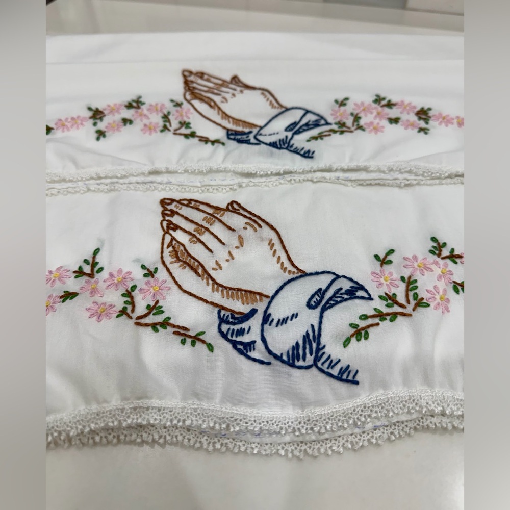 Vintage pair of embroidered pillow cases prayer hands